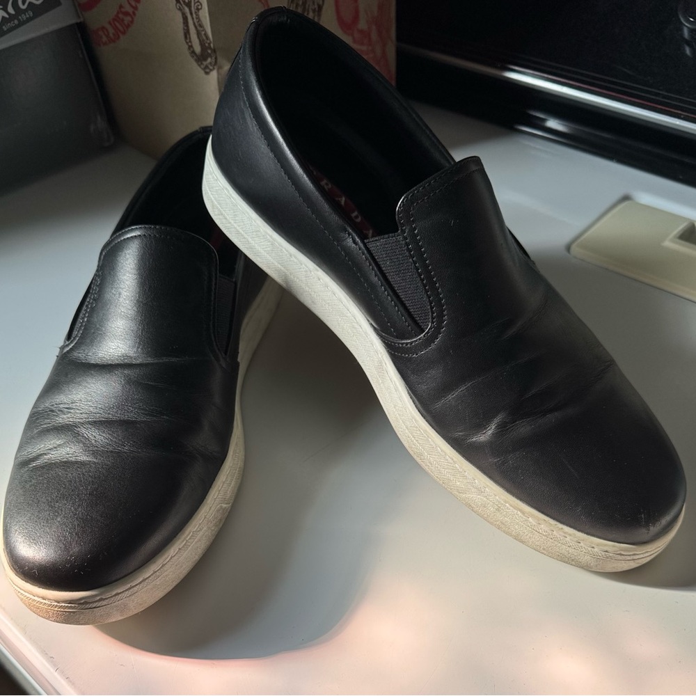 Prada Men's Black Slip-On Loafers..
Fit large I’m 10.5 - 11 and fit perfectly.
